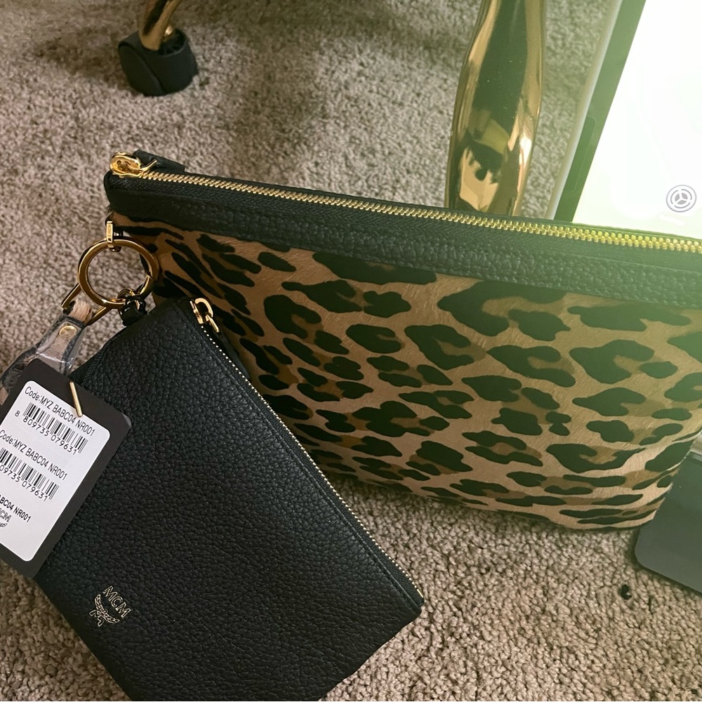 Clearance! Price firm! New MCM one size pouch set $380+ tax